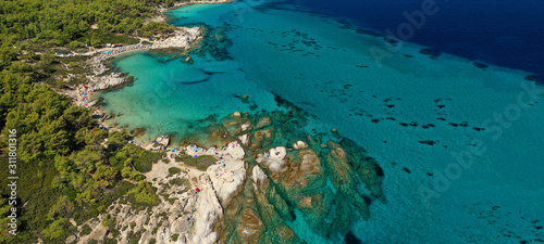 Aerial drone ultra wide photo of tropical exotic bay with emerald crystal clear sea