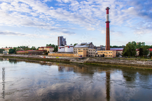 Bild auf Leinwand Osijek / Croatia: 10th May 2019: Industrial part of Osijek at the Drava river ba
