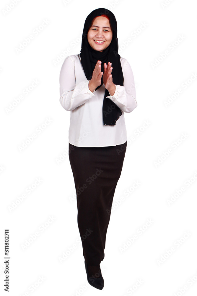 Muslim Woman Smiling Friendly and Clapping Hands Giving Applause, Full Length Portrait Muslim Woman Smiling Friendly and Clapping Hands Giving Applause, Full Length Portrait