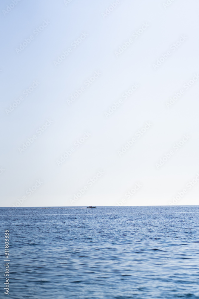 Obraz premium Caribbean sea surface summer wave background. Exotic water landscape with clouds on horizon. Natural tropical water paradise. Cuba nature relax. Travel tropical island resort. Ocean nature tranquility