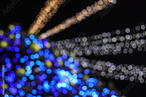 Abstract christmas tree bokeh lights of classic blue and white color blur background. photo