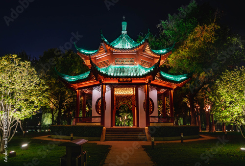 Night view of  Chinese Pavillion with light decoration at East Lake, Wuhan Hubei / China. © siewwy84