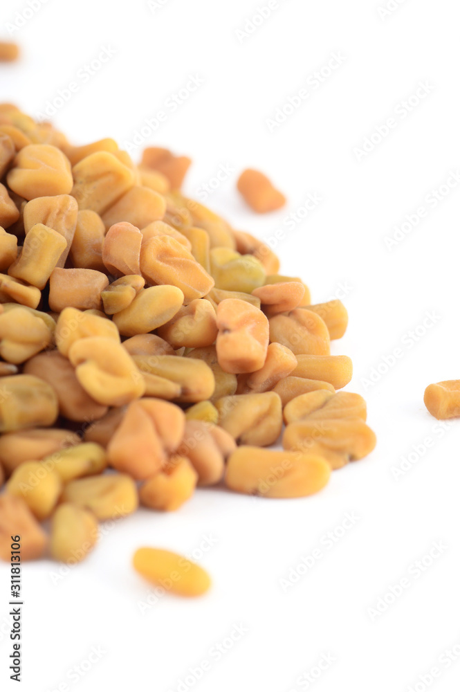 Fenugreek seeds isolated on white background Fenugreek seeds isolated on white background