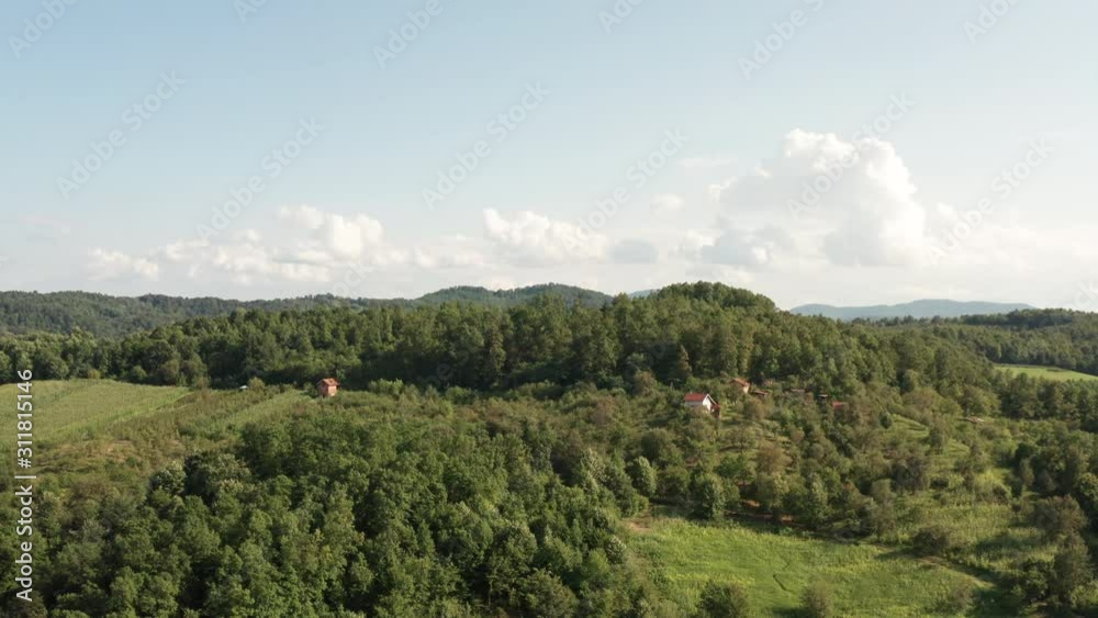 4k Drone flyover Mountains with Green Forest with big trees and hidden small house in top of mountain. 4k Drone flyover Mountains with Green Forest with big trees and hidden small house in top of mountain.