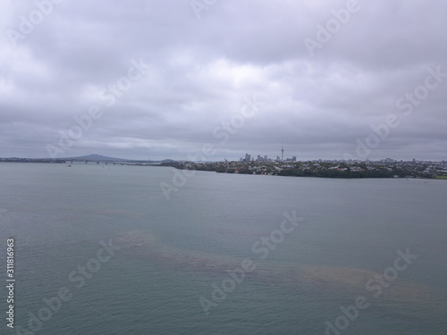 Waiheke Island, Auckland / New Zealand - December 25, 2019: The paradise island Waiheke with its stunning beaches, coastlines, hill terrains and vineyards photo