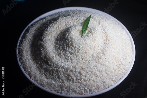 healthy food of the white rice isolated on dark background