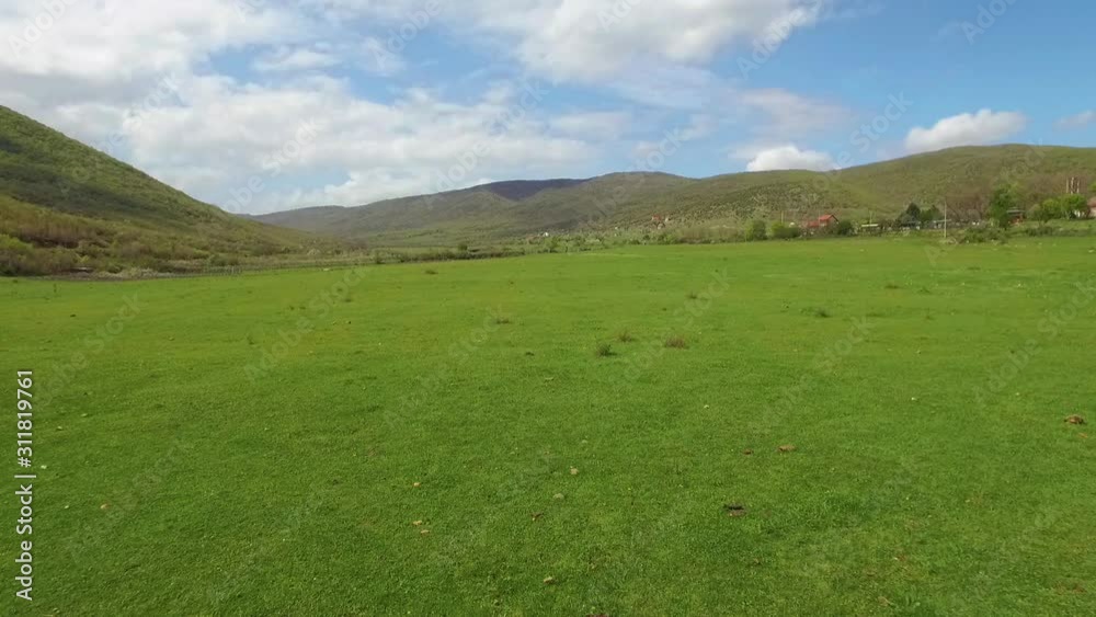Low-Level Flying Drone On Filed. 50FPS Low-Level Flying Drone On Filed. 50FPS