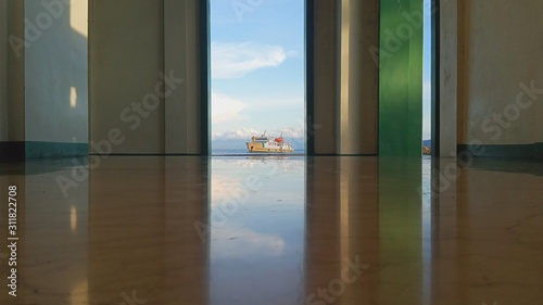 The ship is seen from inside the mosque building