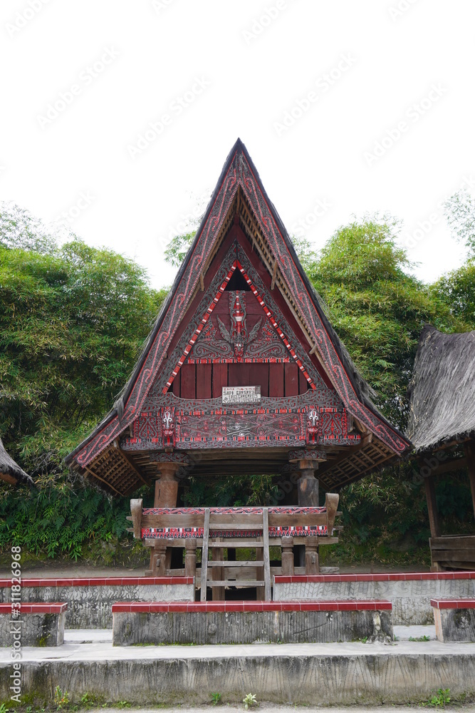 House of people in Samosir Island, the large volcanic island in Lake Toba, located in the north of the island of Sumatra in Indonesia. House of people in Samosir Island, the large volcanic island in Lake Toba, located in the north of the island of Sumatra in Indonesia.