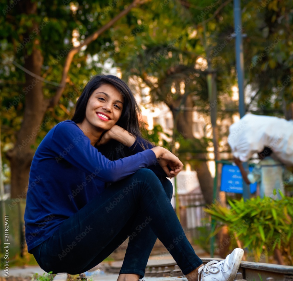 Portrait Young Model Sitting And Posing On Railway Track. Portrait Young Model Sitting And Posing On Railway Track.