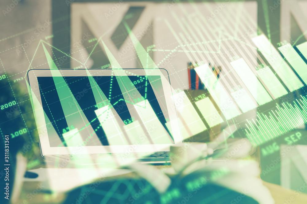 Forex market chart hologram and personal computer background. Double exposure. Concept of investment. Forex market chart hologram and personal computer background. Double exposure. Concept of investment.