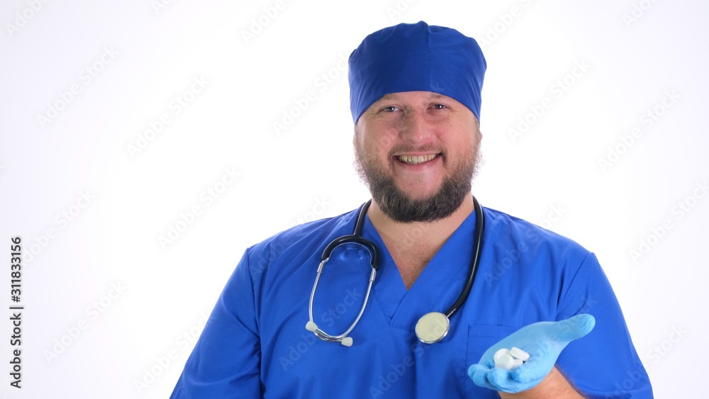 bearded doctor man in blue clothes and blue rubber gloves holds white pills in his hands and offers you a white background, close-up bearded doctor man in blue clothes and blue rubber gloves holds white pills in his hands and offers you a white background, close-up