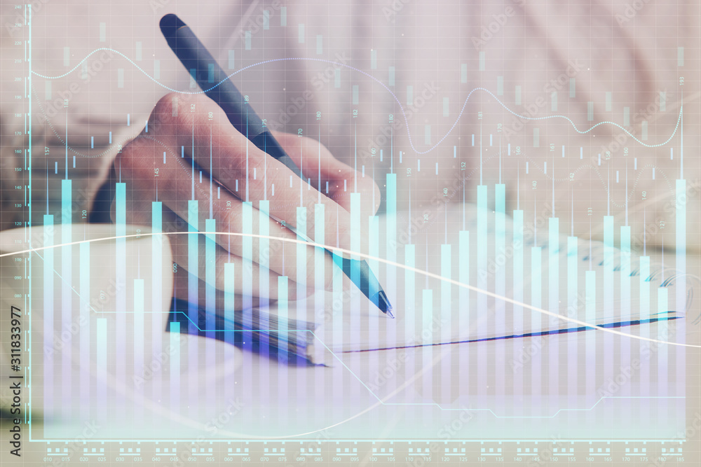 Forex chart displayed on woman's hand taking notes background. Concept of research. Double exposure Forex chart displayed on woman's hand taking notes background. Concept of research. Double exposure