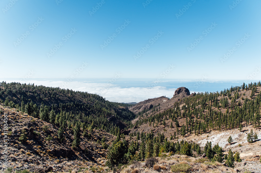 Beautiful panorama of nature above the clouds on the island of Tenerife Beautiful panorama of nature above the clouds on the island of Tenerife