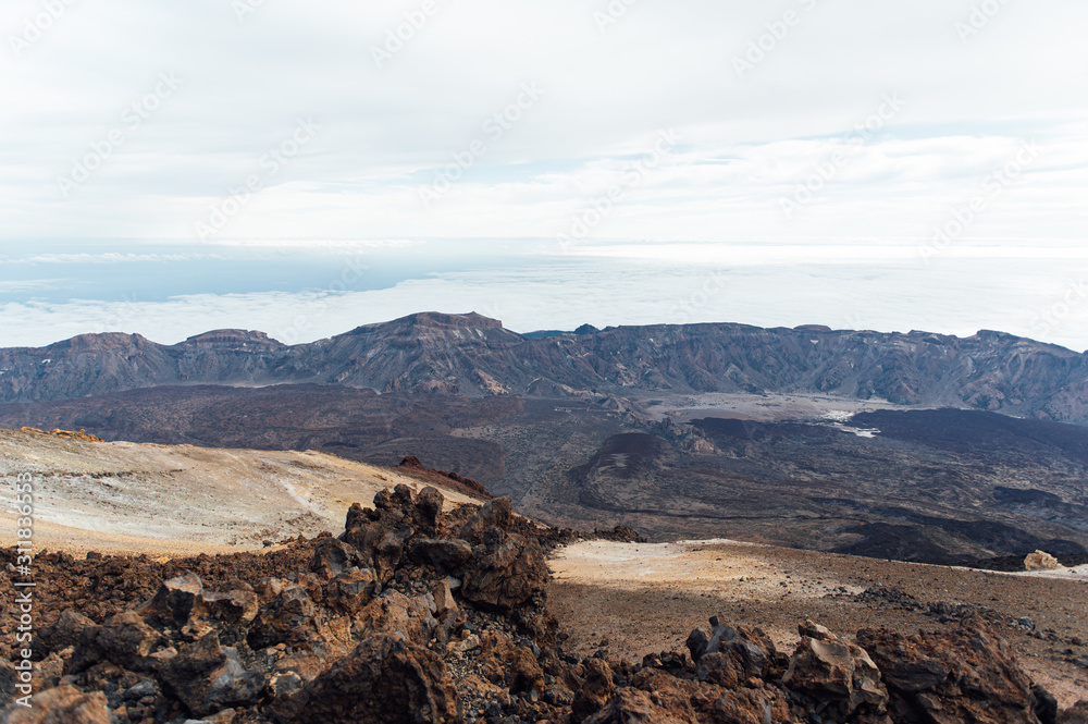 Fototapeta premium Fantastic view of the Spanish volcano Teide. Rocky volcanic view similar to the landscape of another planet - Mars