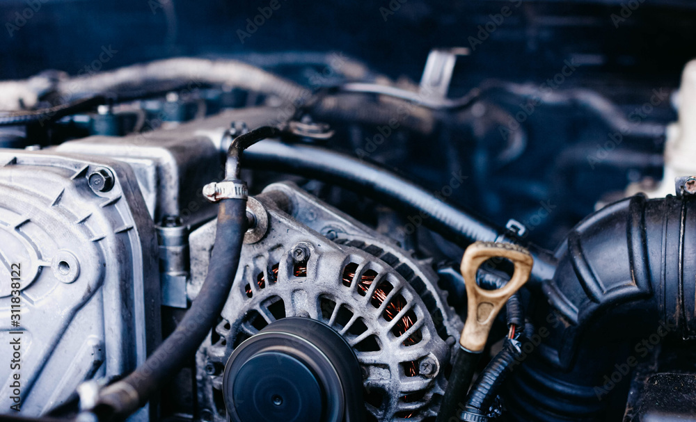 Obraz premium car generator and oil dipstick.