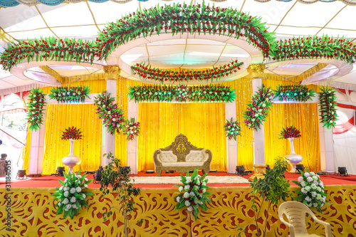 indian wedding ceremony :stage decoration with lighting and flower  photo