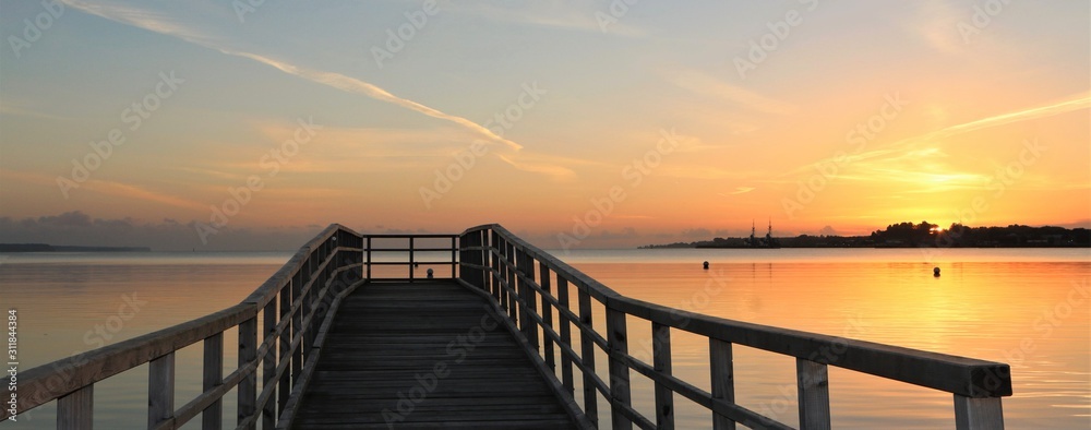 romantic sea bridge at dawn banner