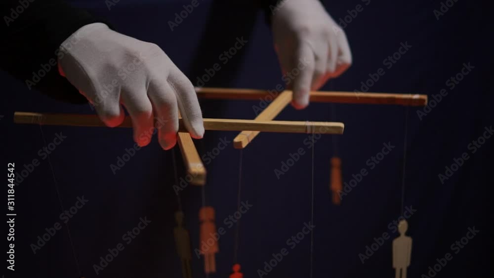 People puppet dolls controlled from above using wires or
