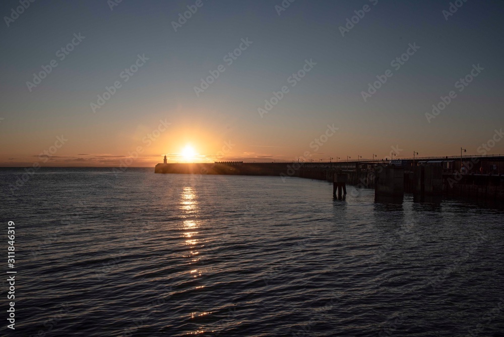 Folkestone's Harbour Arm at sunrise.
