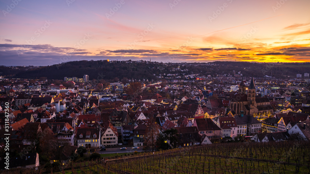 Germany, Famous medieval city skyline of esslingen am neckar, famous for christmas market in christmas time, aerial view above at sunset