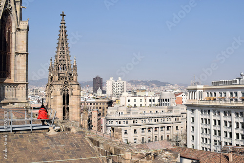 Sunny Rooftop View of Spanish City & Ornate Stone Church Spire 