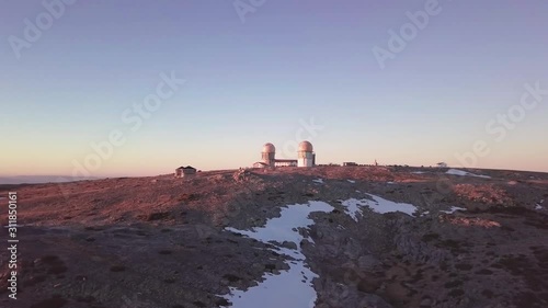 Aerial view of the highest point of Continental Portugal, Serra da Estrela, with a bit of snow - PanLeft photo