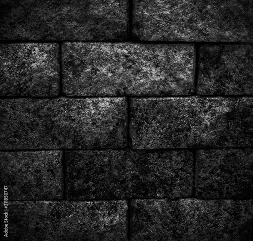 black stone blocks background. Stones texture. The wall of stones.black block and rustic.