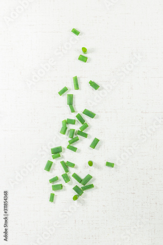 Green onion, green onion, green onion segments on a white background.