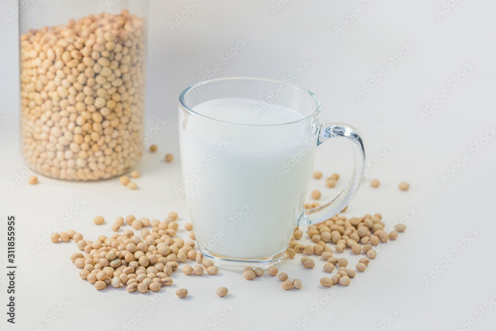 Soy and soy milk on a white background. Soy and soy milk on a white background.