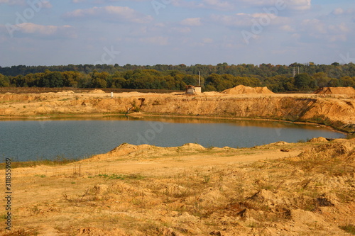 View of the sand and gravel pit, part of the quarry is flooded with water. Maloyaroslavets, Russia