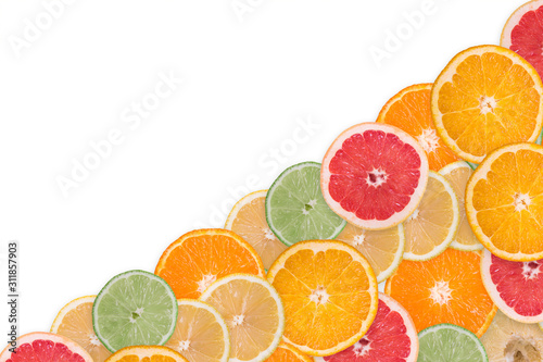 multi-colored citrus slices on a white background