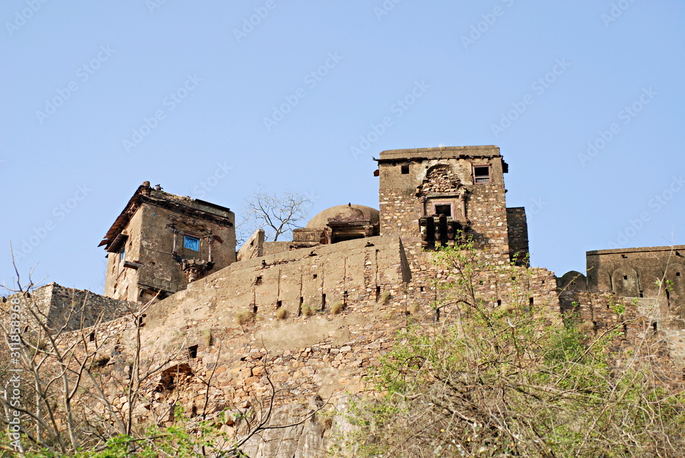 Ranthambhore fort. The Ranthambhore fort is believed to have been built in 944 A.D. by a Chauhan ruler. It is strategically located on the border of Rajasthan, India