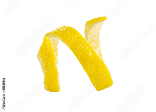 fresh twist lemon peel isolated on a white background