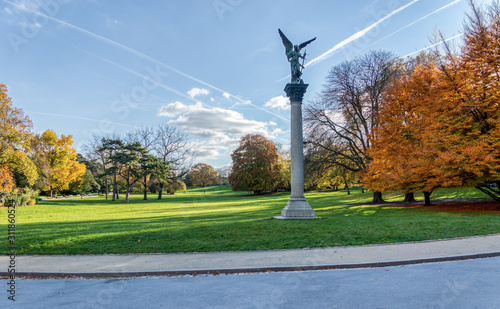 Column of the Armed Peace in Parc Montsouris in autumn (by Jules-Felix Coutan - 1848-1939) - Paris, France photo