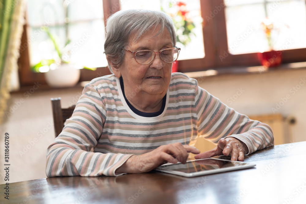 Elderly woman and new technologies Elderly woman and new technologies