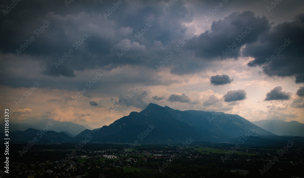 A dramatic sky over the Austrian alps seen from Salzburg fortress Hohensalzburg