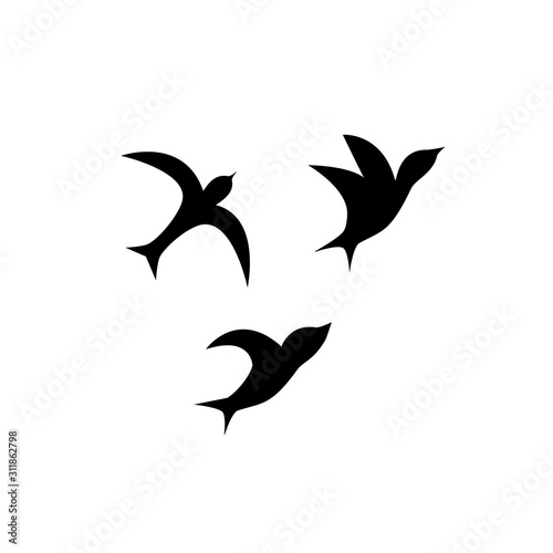 A flock of birds. flying black swallows on a white background. Tattoo, print on t-shirt, autumn, spring, sky.