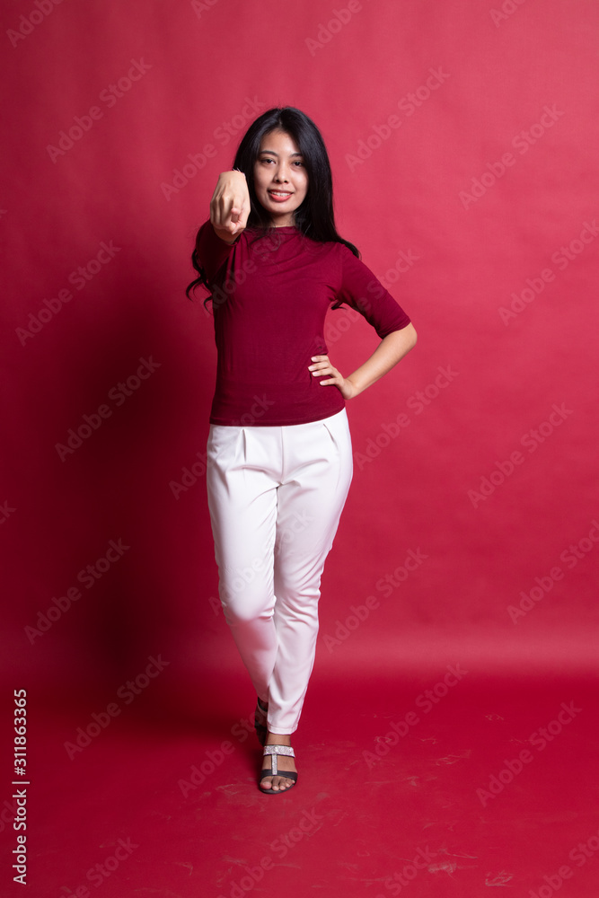 Full body of beautiful young asian woman pointing. Full body of beautiful young asian woman pointing.