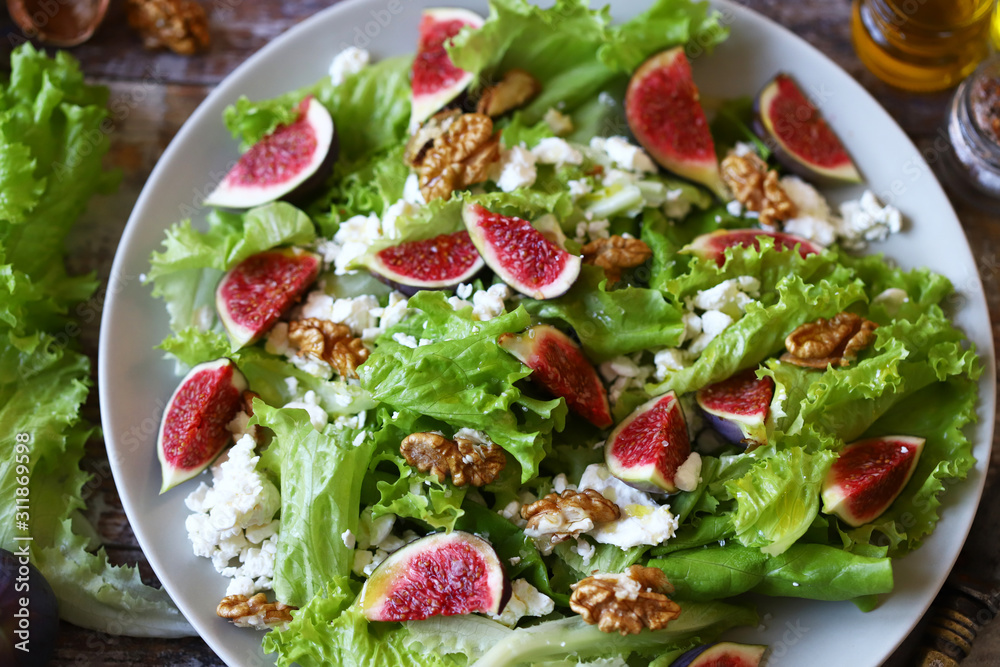 Keto salad with figs and white cheese. Healthly food. Selective focus. Macro.