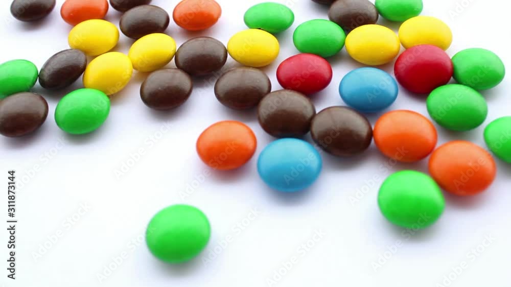 colorful candy on white background, chocolate candy colorful candy on white background, chocolate candy