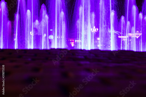 Fototapeta Naklejka Na Ścianę i Meble -  Dubai, United Arab Emirates; Glowing fountains in the Global Village.