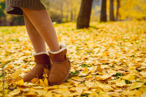 Autumn, girls and yellow gingko leaves