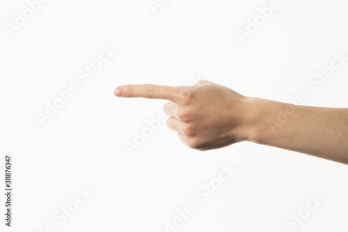 Hand of man showing pointing gesture on white background