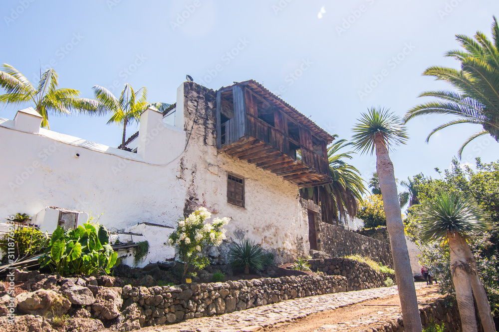 Naklejka premium Picturesque Building In A Square In The Center Of Icod De Los Vinos. April 14, 2019. Icod De Los Vinos, Santa Cruz De Tenerife Spain Africa. Travel Tourism Street Photography.