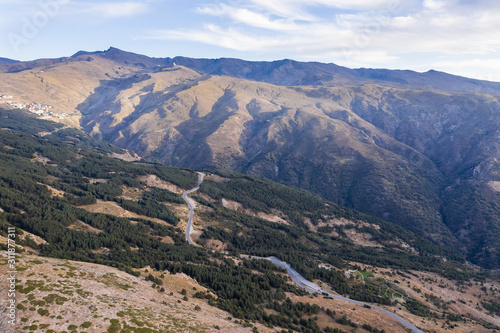 aerial view of a mountain road near Sierra Nevada (Granada) Spain © alexkazachok