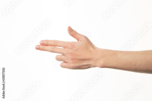 Human hand in shooting gesture isolate on white background