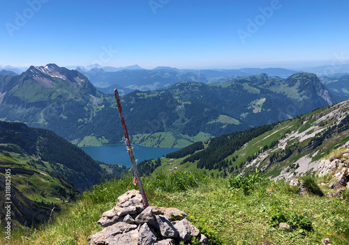 Alpine mountain peak Rossalpelispitz or Rossaelplispitz above the alpine Lake Wagitalersee (Waegitalersee), Innerthal - Canton of Schwyz, Switzerland photo