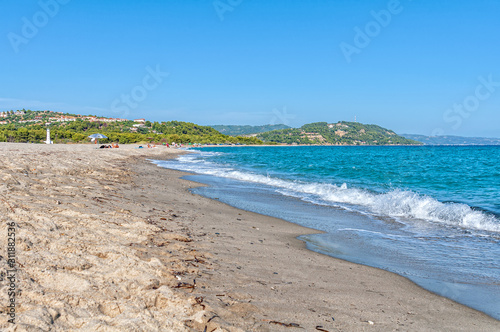 Halkidiki, Greece - September 01,2019: Possidi Beach on Halkidiki, Greece. Blue sea on Aegean sea. Possidi lighthouse. 