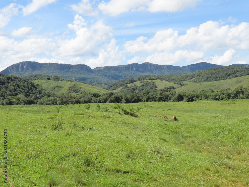 Rural area in the city of Tiradentes Minas Gerais. Brazil. Fields and mountains in the background. Rural area in the city of Tiradentes Minas Gerais. Brazil. Fields and mountains in the background.